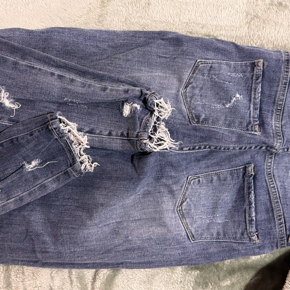Distressed Blue Denim Jeans